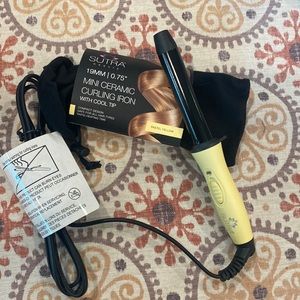 Sutra beauty mini curling iron.  New in packaging/bag. Pastel yellow.